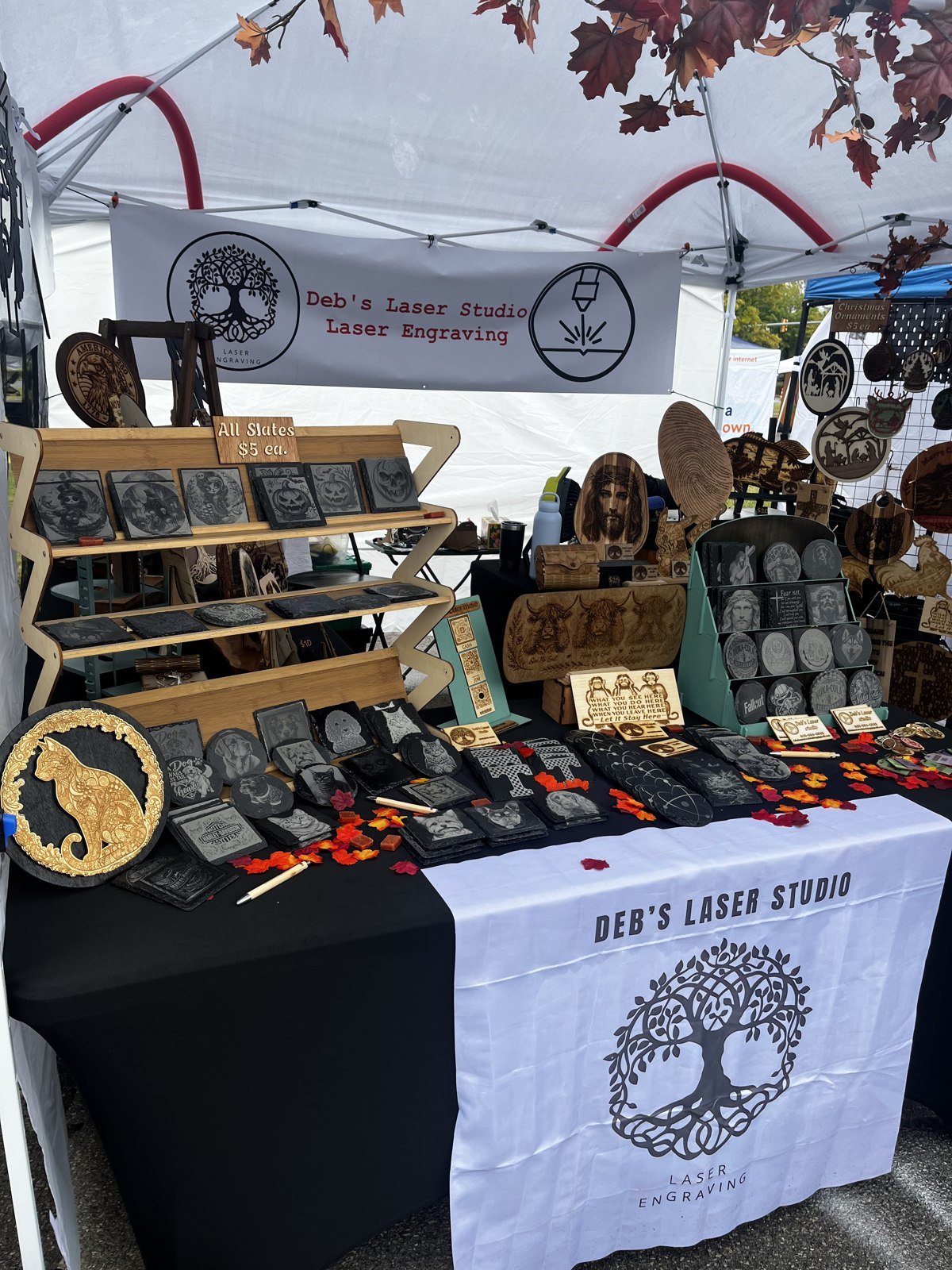 Deb’s Laser Studio stall filled with engraved gifts and wooden artwork